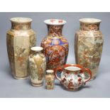 A pair of Japanese Satsuma vases, two others, an Imari vase and a two handled pot, tallest 31cm,