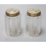 A pair of Victorian silver gilt and turquoise lidded glass cylindrical toilet jars, John Harris,