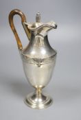 A late Victorian silver hot water pot, London, 1883, maker's mark rubbed, height 26.1cm, gross 12.