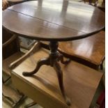 A George III mahogany circular tilt top tea table, 76cm diameter, height 71cm