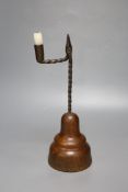 A Georgian wrought iron rush light/candlestick, height 37cm