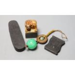 Assorted Chinese small items including two Chinese inkstones, a similar hardstone seal and pendant