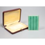 A cased early 20th century Austrian? gilt sterling and green enamelled silver gilt rectangular snuff