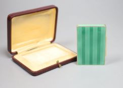 A cased early 20th century Austrian? gilt sterling and green enamelled silver gilt rectangular snuff