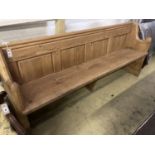 A Victorian stripped pine pew, length 194cm, depth 50cm, height 81cm