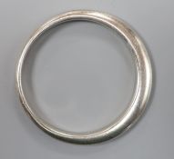 An early 1970's Georg Jensen sterling bangle design no. 168, 75.9 grams, import marks for London,
