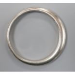 An early 1970's Georg Jensen sterling bangle design no. 168, 75.9 grams, import marks for London,