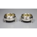 A pair of George V silver bun salts, William Comyns & Sons Ltd, London, 1932/3, diameter 6cm, 4oz.