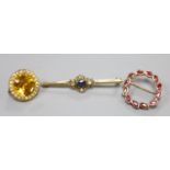 A 9ct gold sapphire and diamond bar brooch, 48mm, gross 2.9 grams, a 375 and ruby wreath brooch,