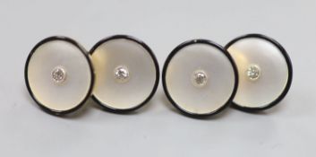 A pair of yellow metal (stamped 18), mother of pearl , black enamel and diamond set cufflinks, 12mm,