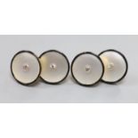 A pair of yellow metal (stamped 18), mother of pearl , black enamel and diamond set cufflinks, 12mm,