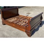 A reproduction mahogany sleigh bed, width 145cm, length 205cm