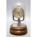 A Bulle type electric mantel timepiece under a dome, overall height 25cm