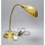 A brass anglepoise 'shell' desk lamp