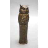 After Bergman. A bronze of an owl embracing a nude lady, height 19cm