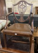 A George III mahogany elbow chair