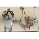 A metal framed ceiling lantern and a three branch cherub and lustre hung ceiling pendant (2)