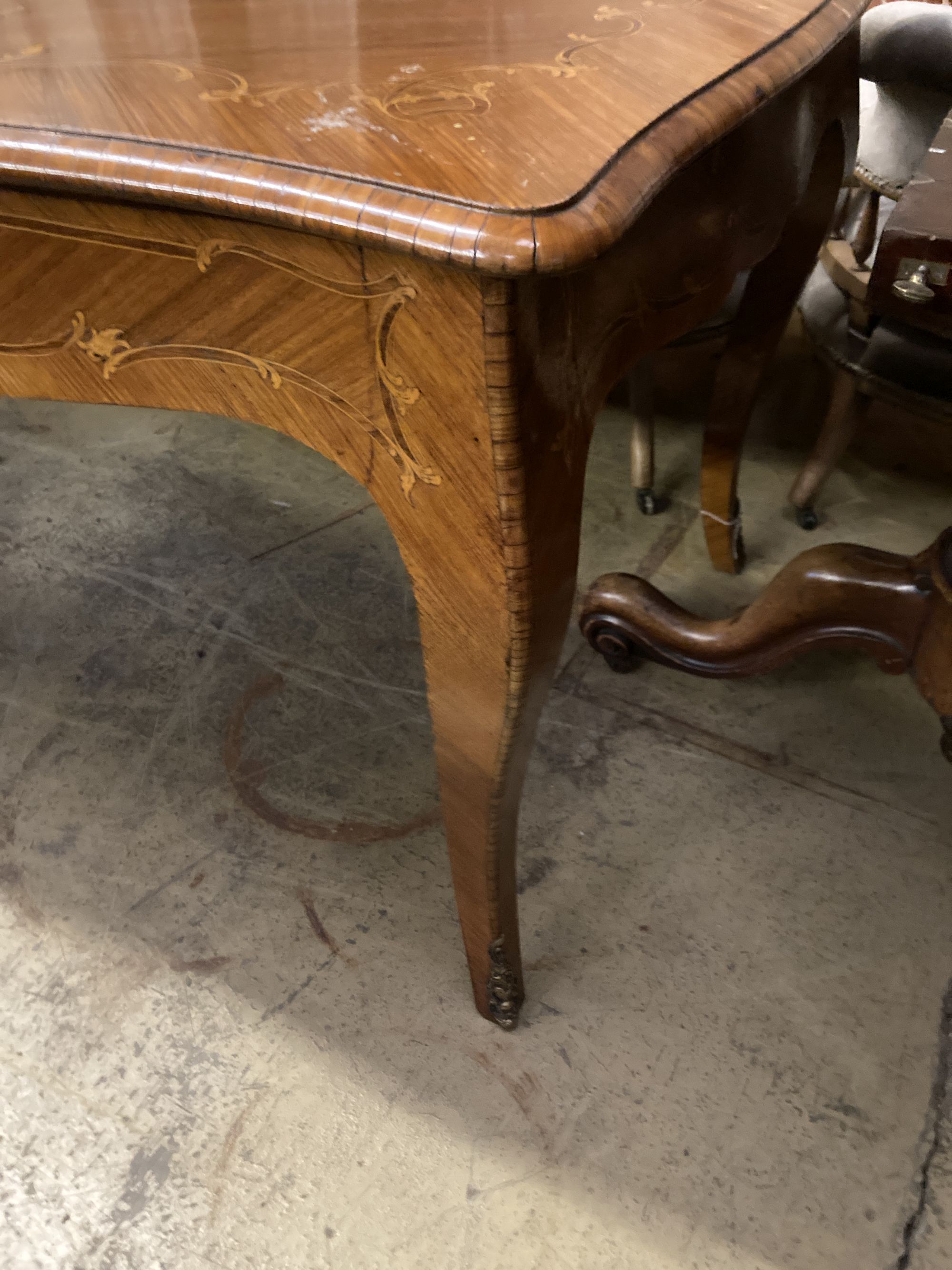 A Louis XVI design marquetry inlaid kingwood serpentine centre table W.196cm. D 90cm. H 79cm. - Image 3 of 6