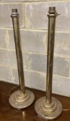 A pair of brass floor lamps, formerly from the Brighton Grand, height 80cm