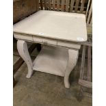 A rectangular French style painted two tier occasional table, width 71cm, depth 59cm, height 62cm