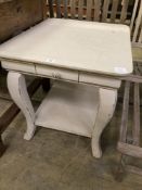 A rectangular French style painted two tier occasional table, width 71cm, depth 59cm, height 62cm