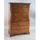 A George III mahogany chest on chest, with dentil cornice, two short and six graduated long drawers,