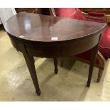 A George III style inlaid mahogany 'D' shaped folding card table, width 92cm, depth 46cm, height