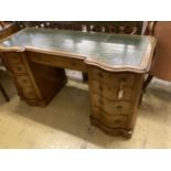 A Victorian style mahogany pedestal kneehole desk, width 138cm, depth 56cm, height 72cm