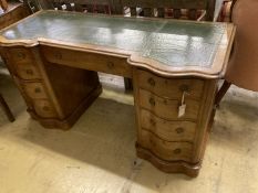 A Victorian style mahogany pedestal kneehole desk, width 138cm, depth 56cm, height 72cm