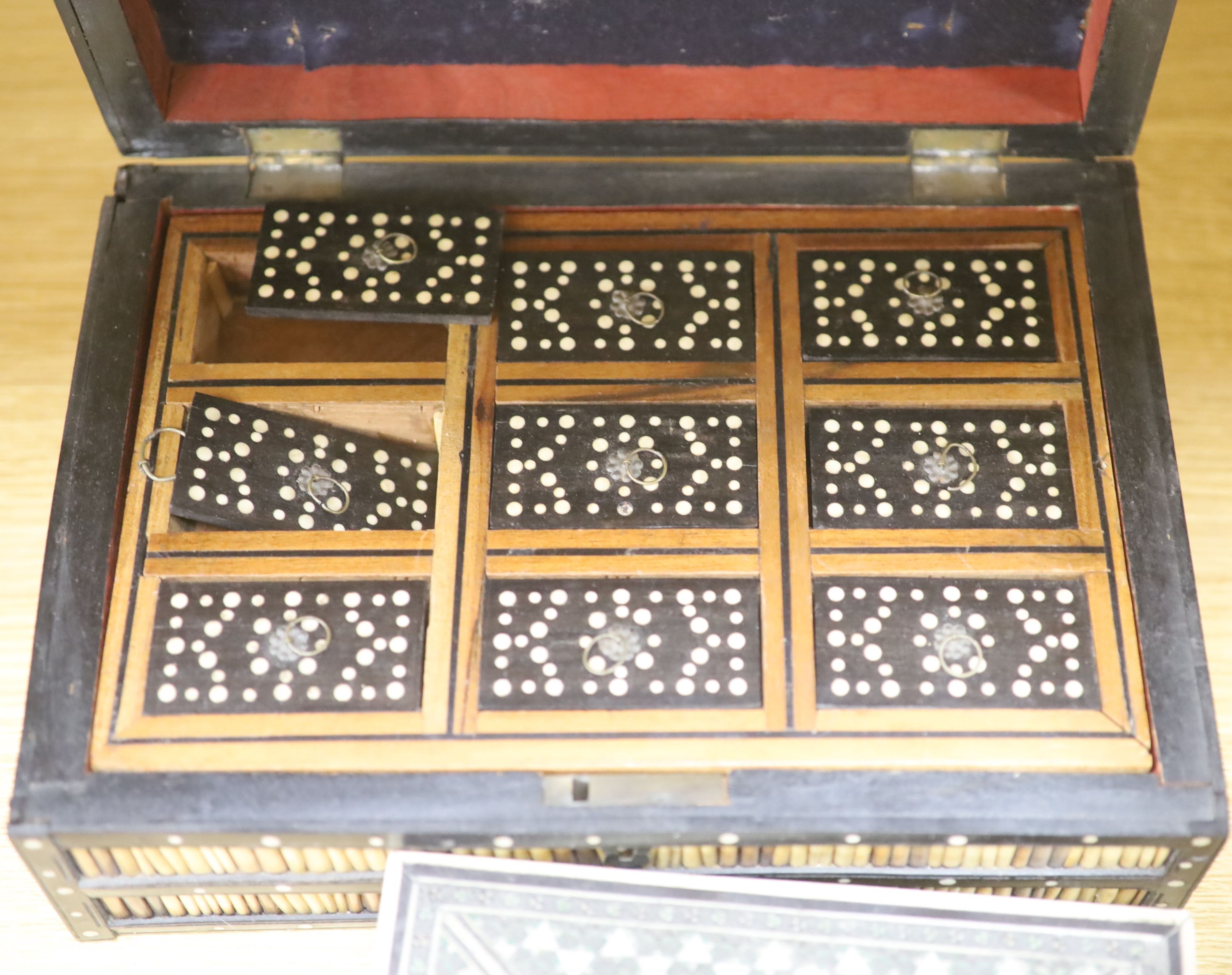 Four Ceylonese quillwork boxes, early 20th century, largest 28 x 19 x 10cm, an Indian inlaid box a - Image 9 of 10