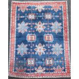 An Iranian Loribaft blue ground rug, with field of floral motifs and three row border, 225 x