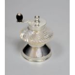 An Edwardian silver mounted wrythened glass pepper mill, Hukin & Heath, Birmingham, 1907, 84mm.