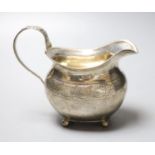 A George III silver cream jug, London, 1817, maker Andrew Fogelburg, height 13cm, 6oz.CONDITION: