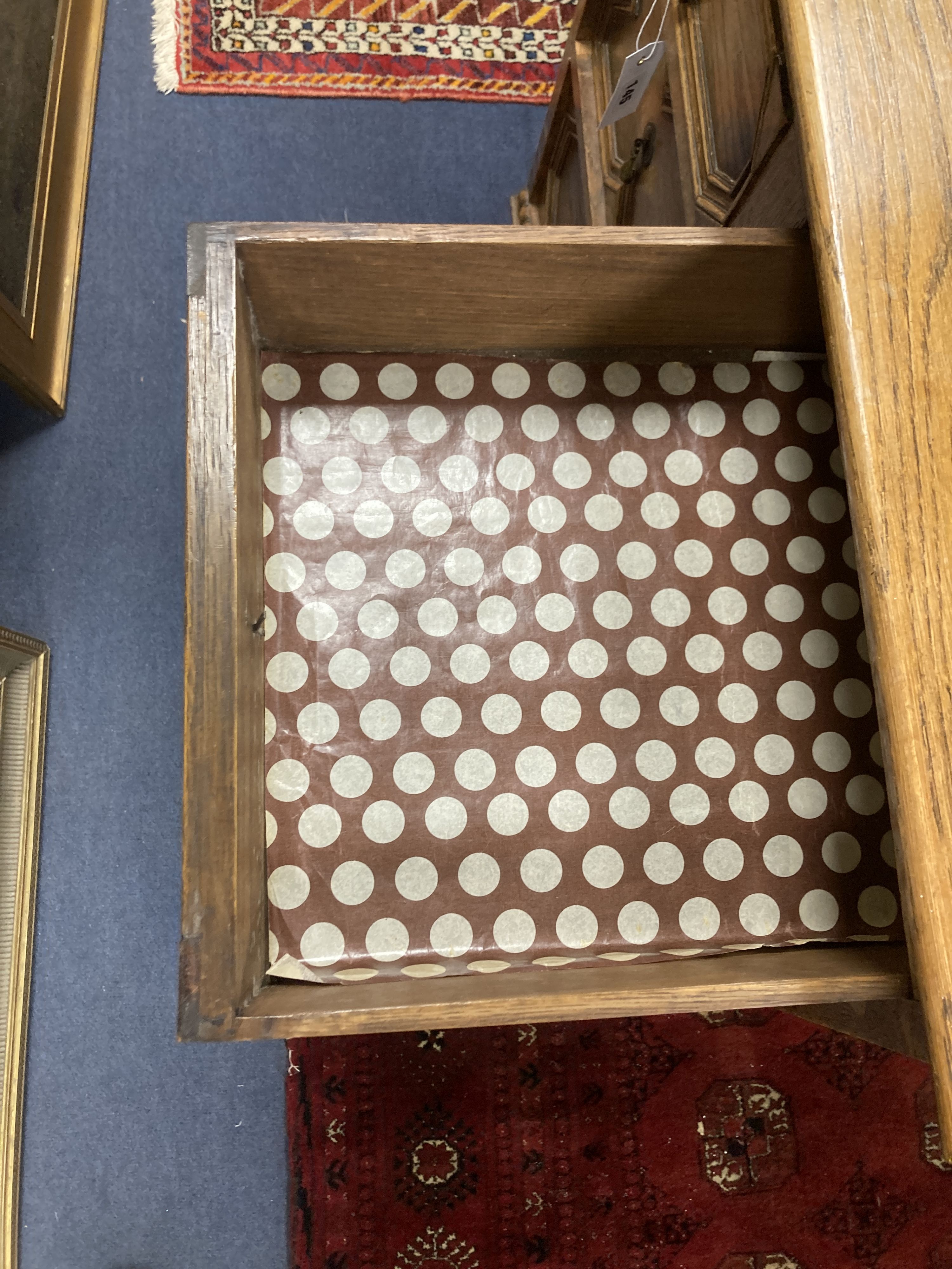 An early 20th century Jacobean style oak four drawer chest, width 81cm, depth 46cm, height 76cm - Image 4 of 4