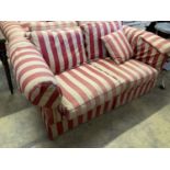 A pair of modern Chesterfied settees with red and cream upholstery (upholstery worn), length