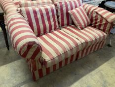 A pair of modern Chesterfied settees with red and cream upholstery (upholstery worn), length