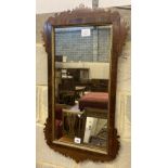 A George III style mahogany fret cut wall mirror, width 42cm, height 80cm