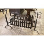 A rectangular wrought iron fire basket, width 114cm, depth 56cm, height 62cm and dogs