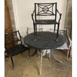 A painted aluminium circular garden table, 106cm diameter together with four matching elbow chairs