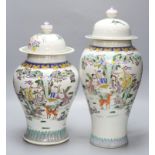 Two Chinese famille rose vases and covers, tallest 47cm