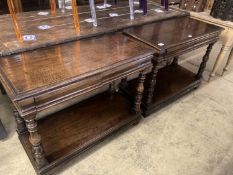 A pair of 17th century style rectangular oak two tier two drawer side tables, width 99cm, depth