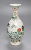 A Chinese famille verte bottle-shaped footed vase, 19th century, decorated with chrysanthemum,