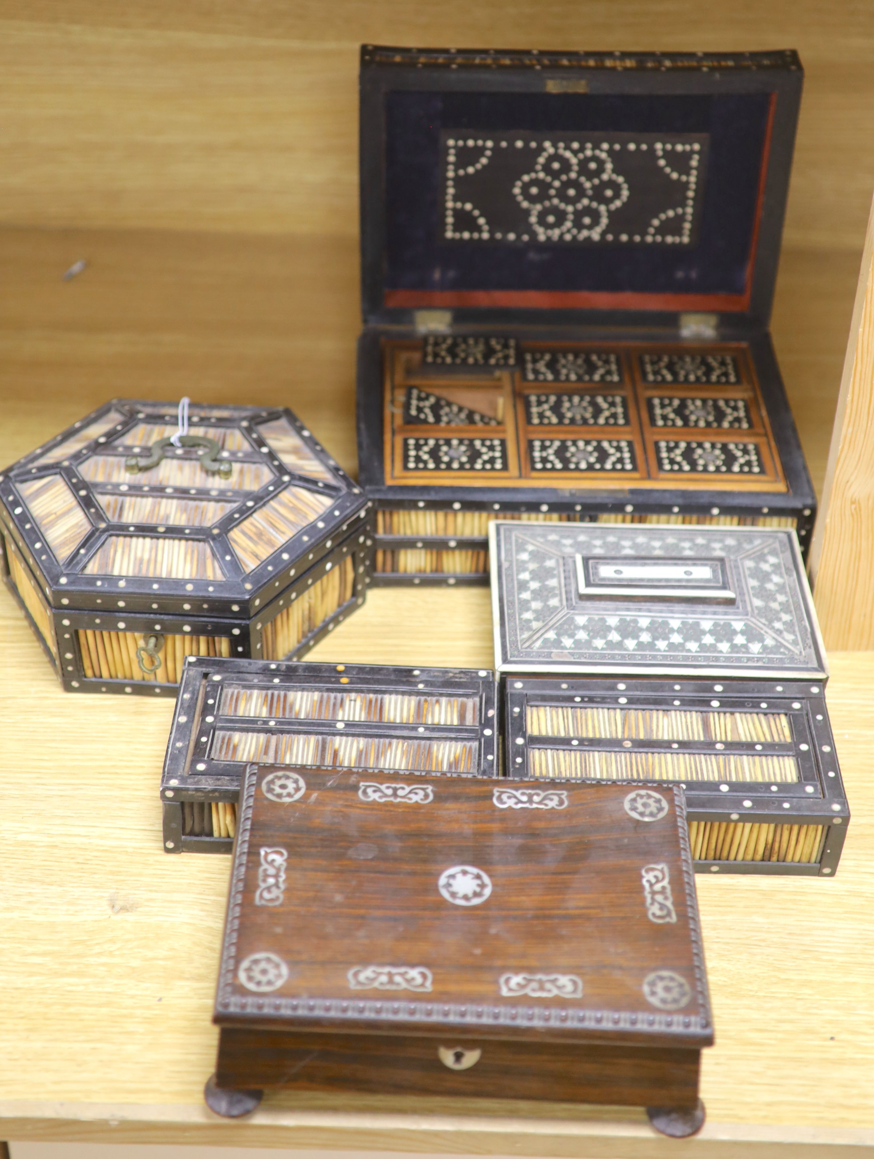 Four Ceylonese quillwork boxes, early 20th century, largest 28 x 19 x 10cm, an Indian inlaid box a