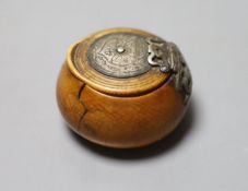 A 17th century French white metal mounted ivory snuff box, with pique work to inner lid, diameter