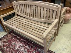 A brand new teak garden bench, length 150cm, depth 62cm, height 92cm