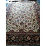 A Heriz ivory ground carpet, 326 x 237cm