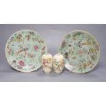 A pair of Cantonese celadon ground dishes, painted with birds and flowers, diameter 19cm, and a pair