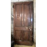 A Victorian painted pine four panelled internal door, width 99cm, height 220cm
