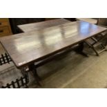 An 18th century style rectangular refectory dining table on trestle end supports, length 212cm,