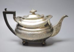 A George III silver ovoid teapot, London, 1813, gross 18oz, marks very rubbed.